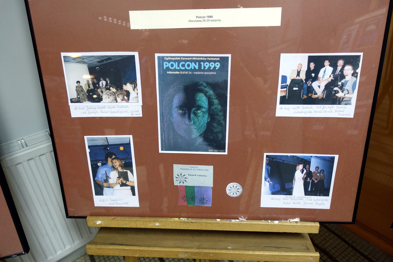 Part of the exhibition showing four picture, poster and badge from Polcon 1999