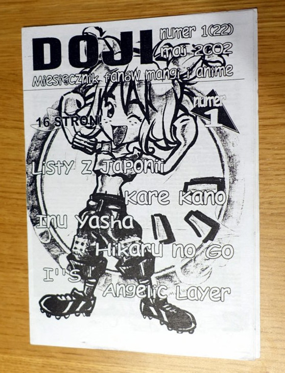 Black and White cover of the magazine. It depicts a girl drawn in manga style.