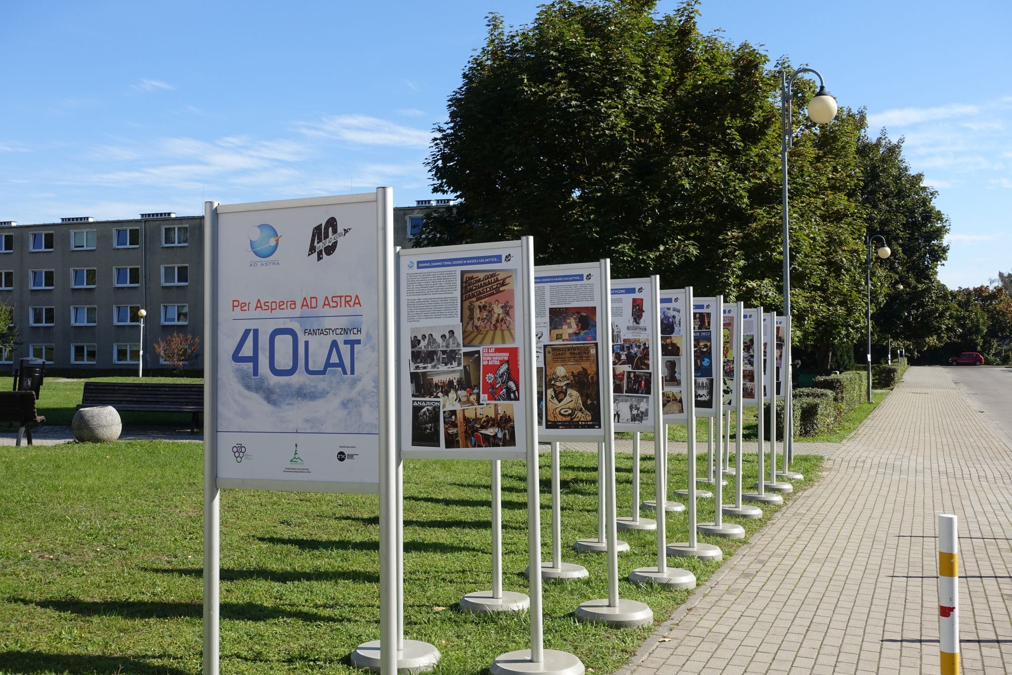 Outdoor exhibition featuring multiple stands.